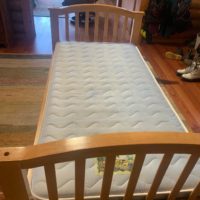 Twin Bed.  Mattress and wood bed frame. Used, but in great shape.