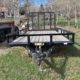 12 foot PJ utility trailer. Like new. Ramp and spare tire.